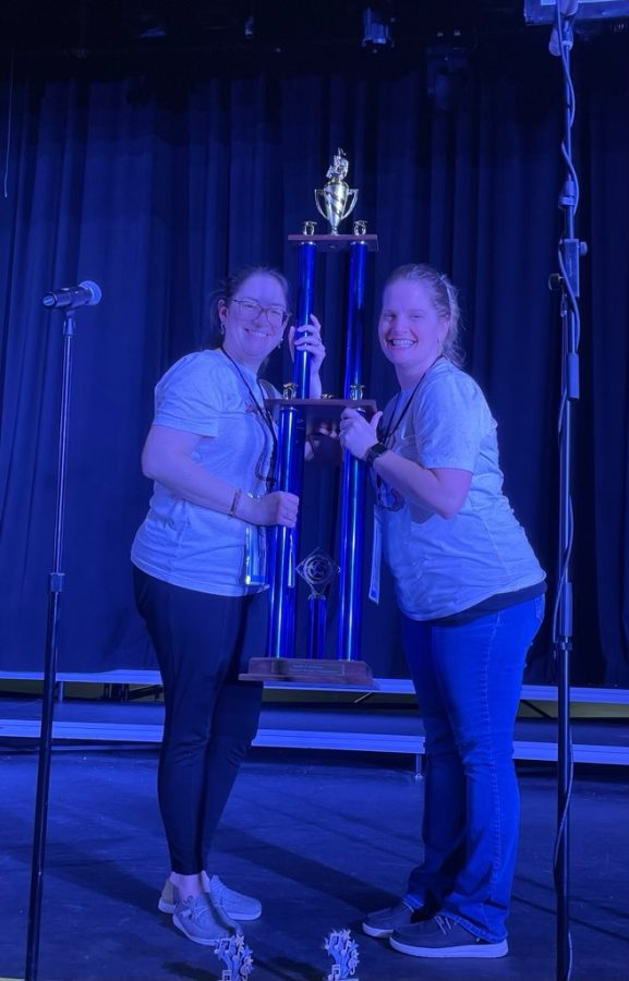 Mrs. Fields and Mrs. Wolf holding grand champ trophy! 