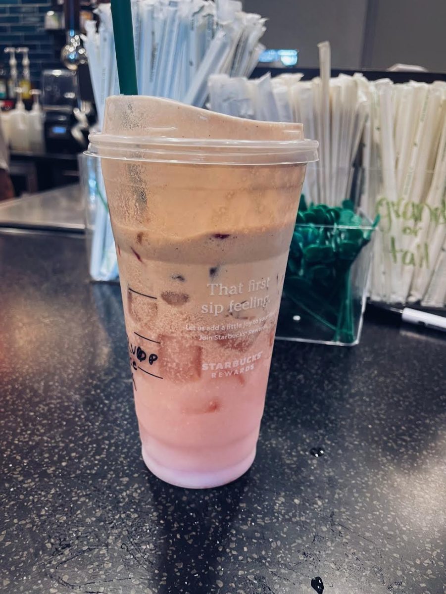 The author's pink drink ordered with chocolate cold foam and tastes like a chocolate-covered strawberry from Starbucks. 