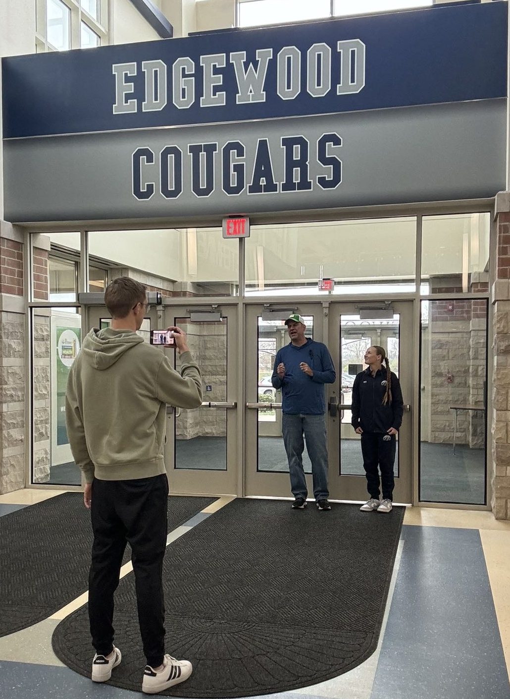 Mr. Geygan begins his "walk" with senior Evelyn Henson.  