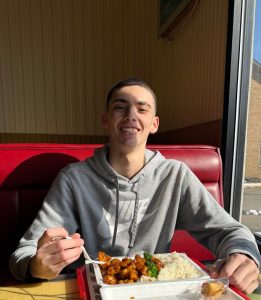 EHS junior Carson Downie enjoys a lunch special at Dragon China. 